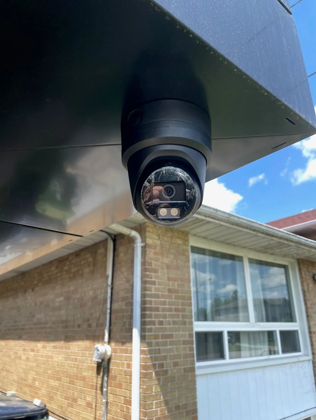 Eave-mounted turret camera